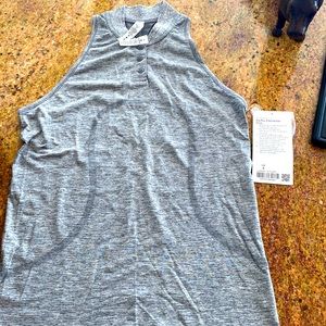 Brand new with tags Lululemon swiftly sleeveless polo in size 6